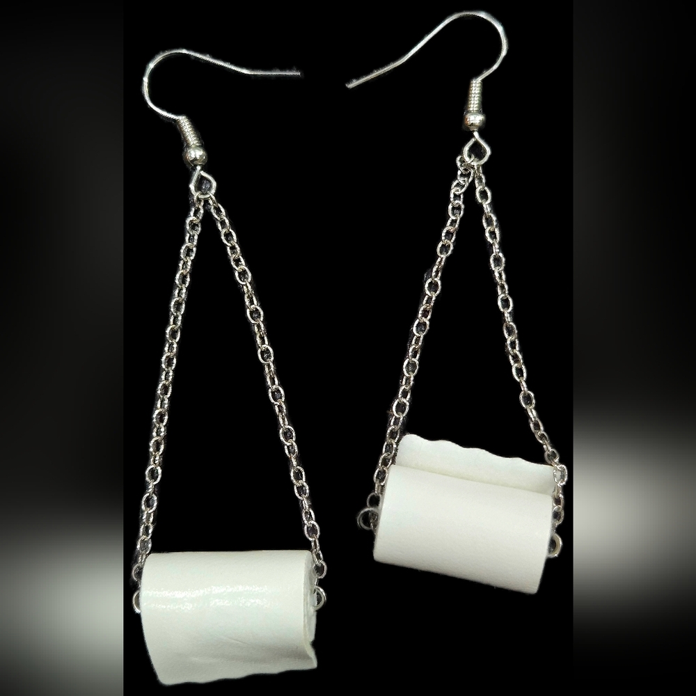Fun earrings simulating toilet paper.